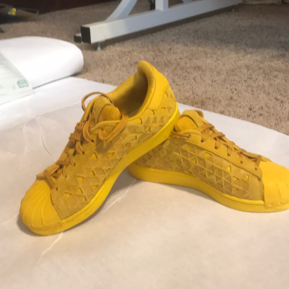 Yellow adidas superstar